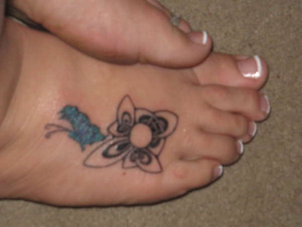 Irsh love knot with a butterfly tattoo