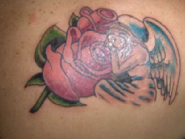 My First tattoo Angelic Rose tattoo