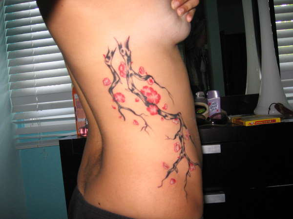 Cherry blossom tree branch tattoo