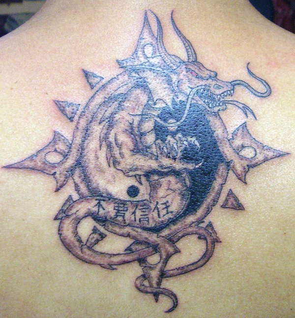 dragon in stone tattoo