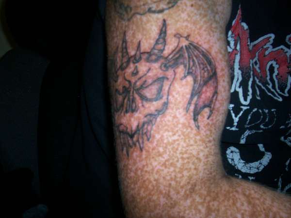 skull & wings tattoo