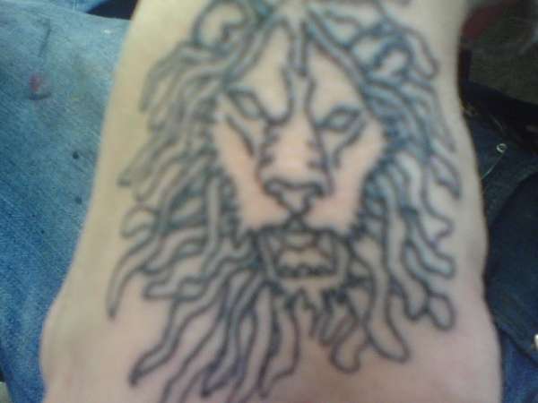 Lion of buddah tattoo