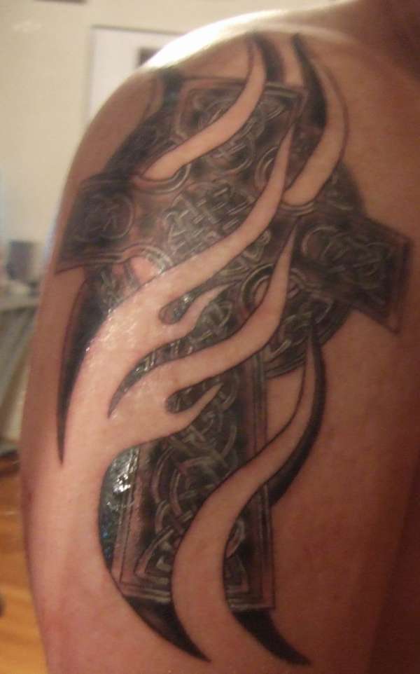 Celtic cross with embedded flame tattoo