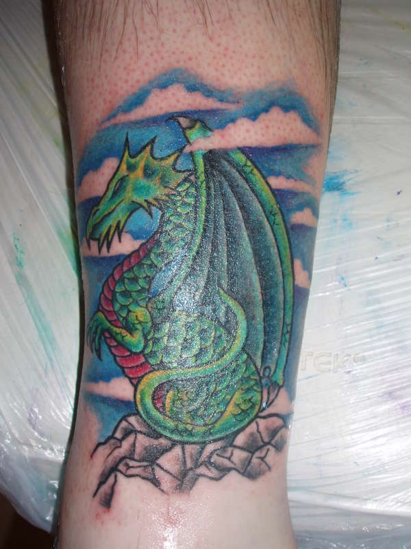 Dragon cover-up on my husband's leg tattoo