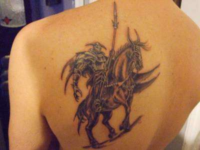 Dark Warrior on Horse Back tattoo