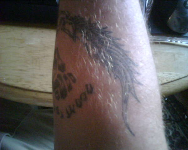 Adamscheck tattoo