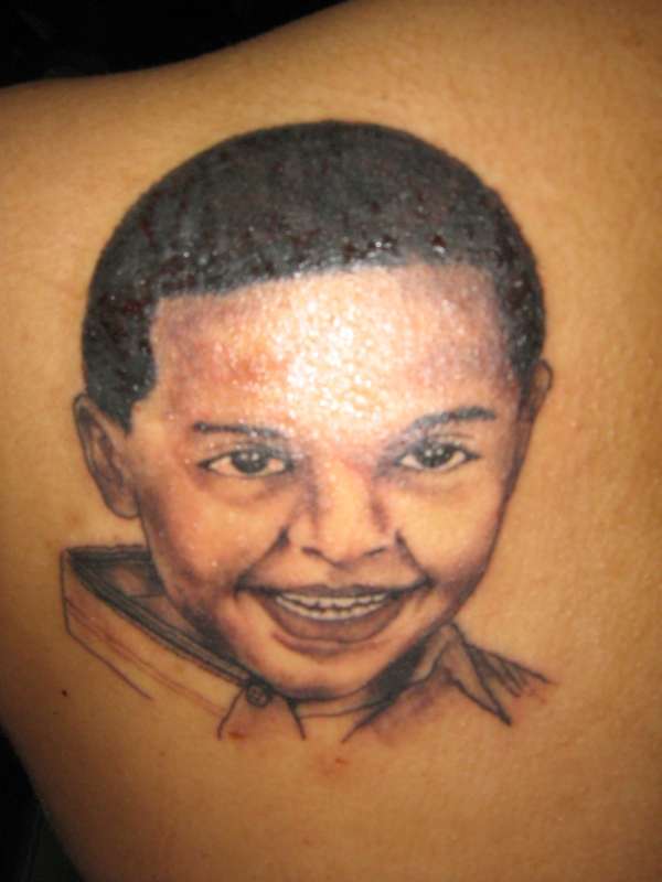 portrait on back tattoo