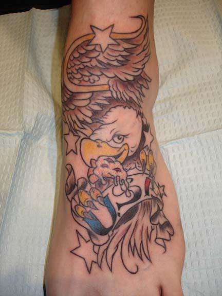 Eagle eating pizza tattoo