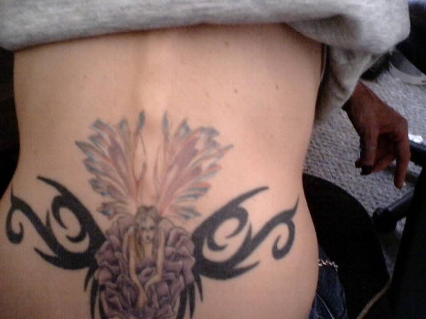fairy/tribel lower back tattoo