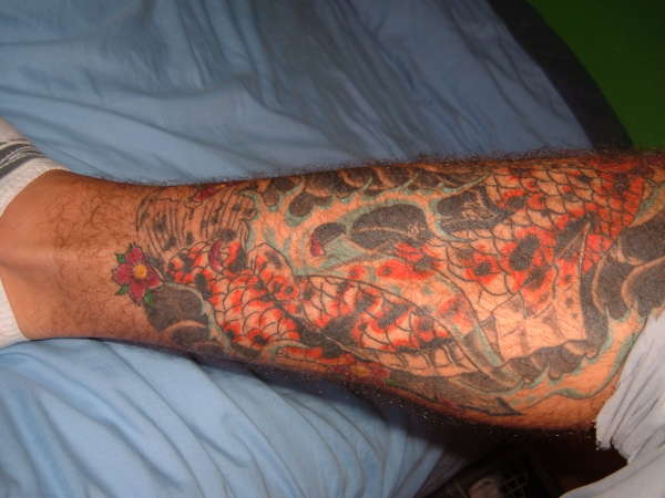 koi side of leg tattoo