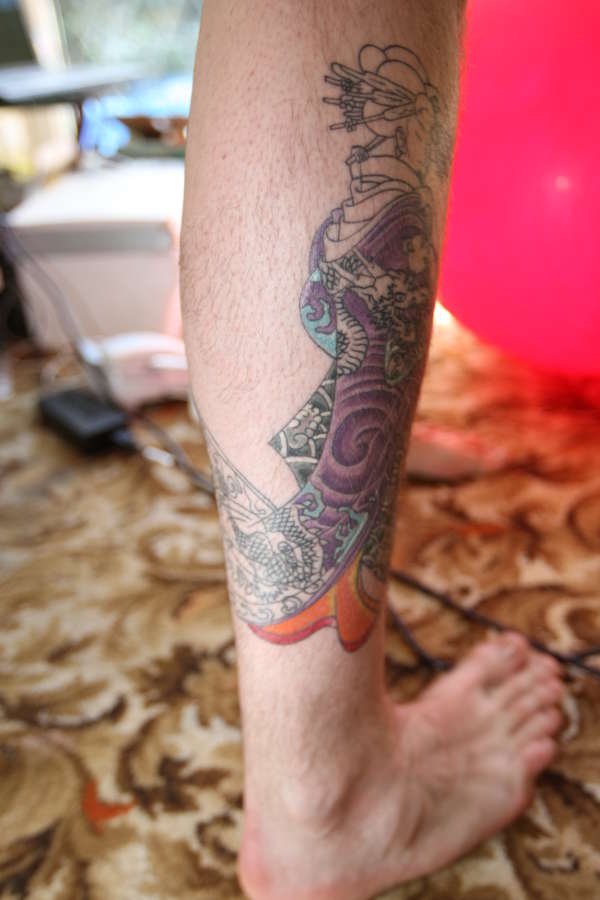 unfinished leg sleeve tattoo