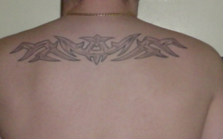 tribal on my upper back tattoo