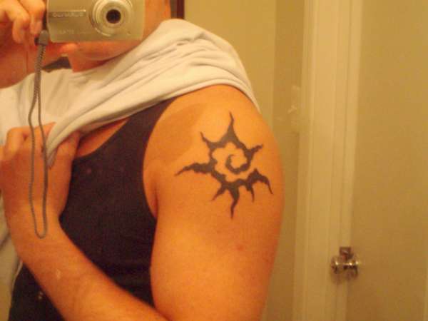 Tribal Sun tattoo