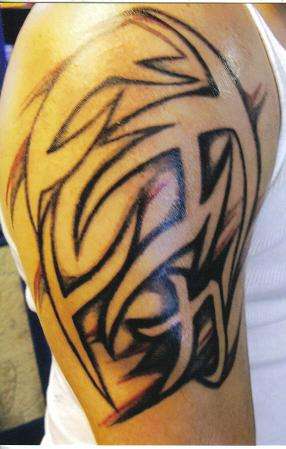 negative tribal/kanji symbol tattoo