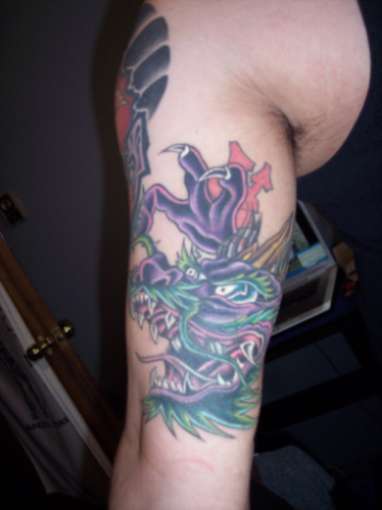 dragon coverup tattoo