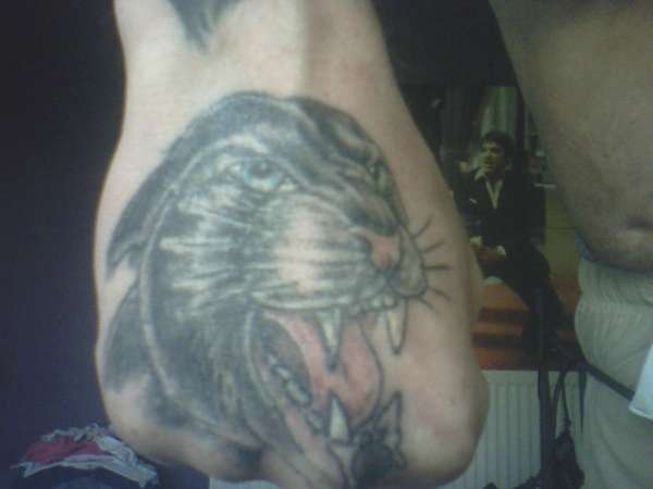 panther cover up tattoo
