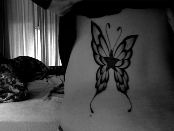 star/butterfly tattoo