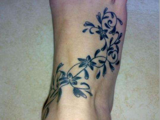 Flowers and leaves tattoo