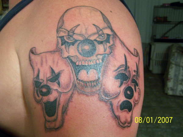 The masks of a Clown tattoo