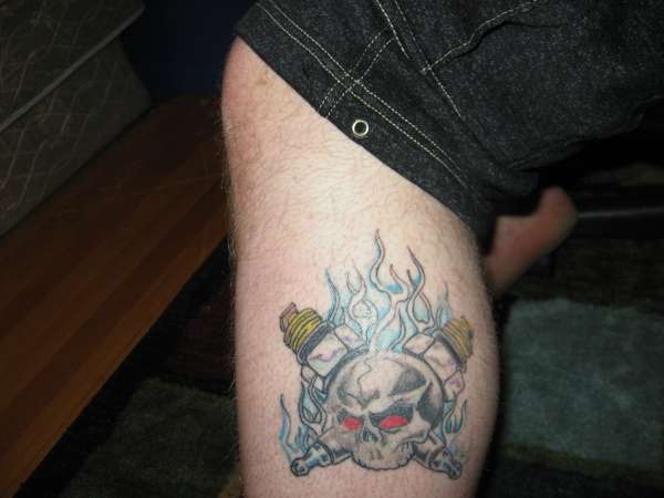 flames ,skull ,sparkplugs tattoo