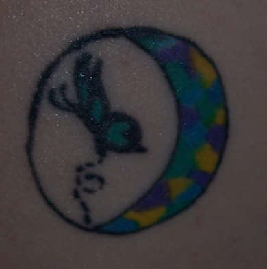 Crest moon with butterfly tattoo