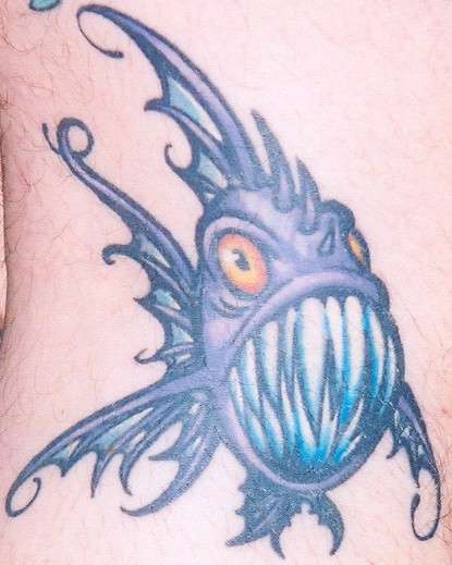 Fish "Healed" tattoo