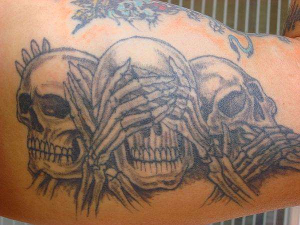 Three Skulls tattoo