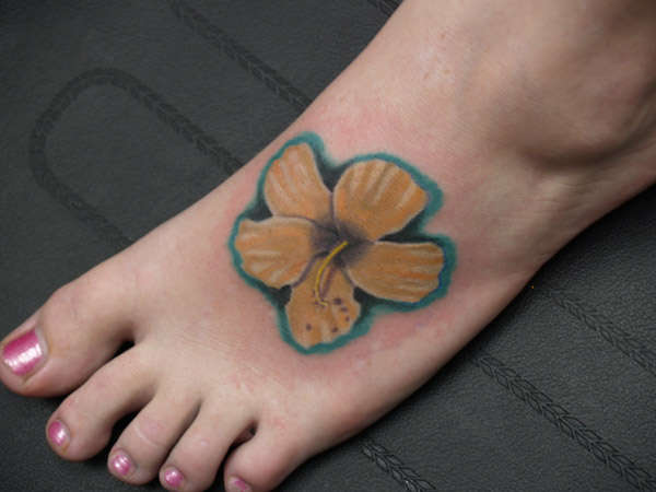 Flower on Foot tattoo