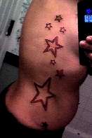 rib stars tattoo