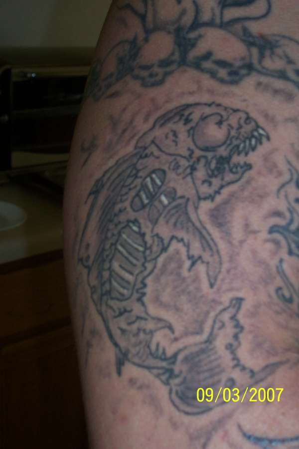 dead fish tattoo