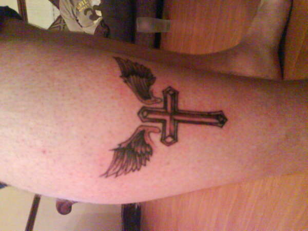 My First Tattoo Cross With Wings tattoo