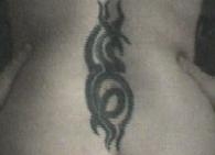 spine piece tattoo