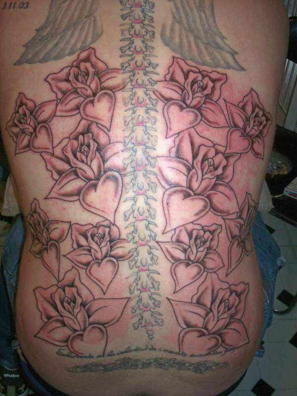 Black/grey roses tattoo