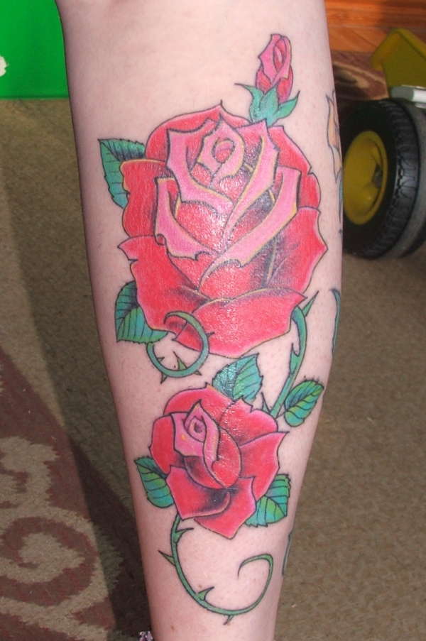 back of my calf roses tattoo