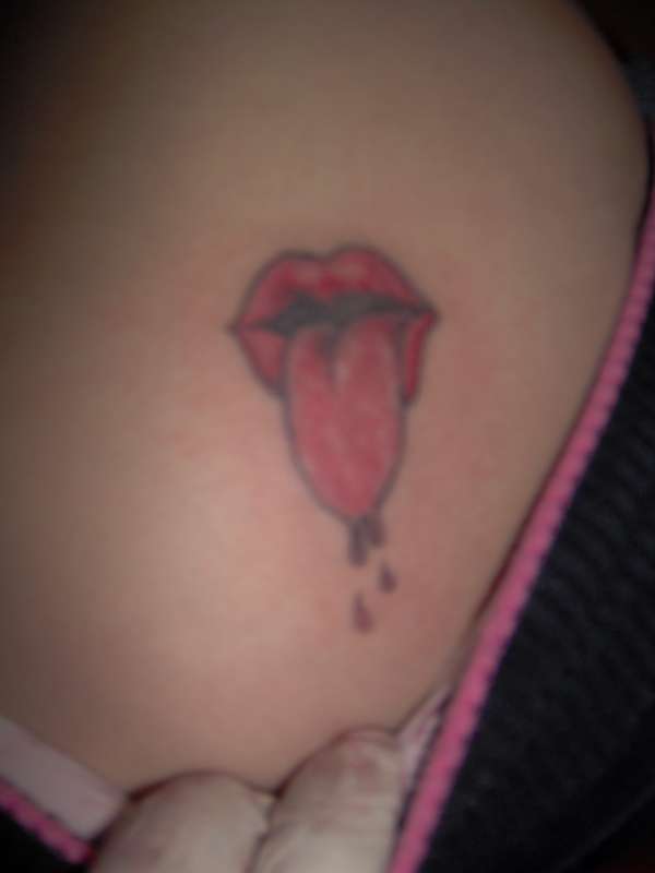 Dripping tongue tattoo
