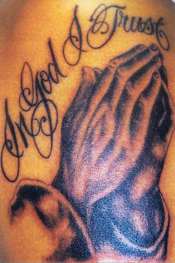 praying hands tattoo