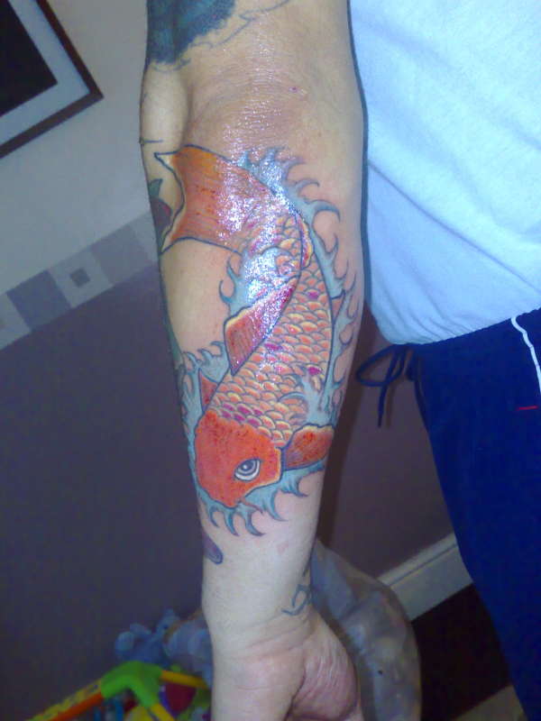 koi with colour tattoo