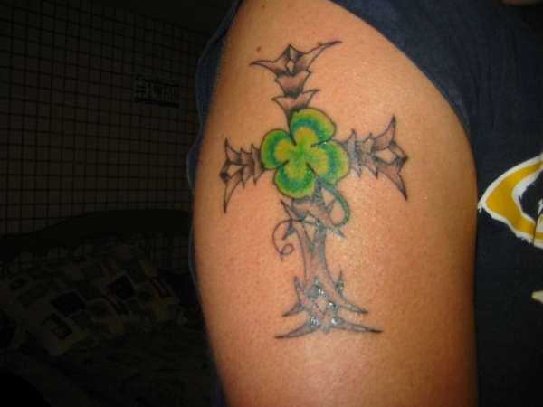 Tribal cross with shamrock tattoo