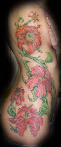 big custom flowers by johnny love tattoo