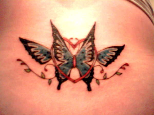 Jodis lower back tat tattoo