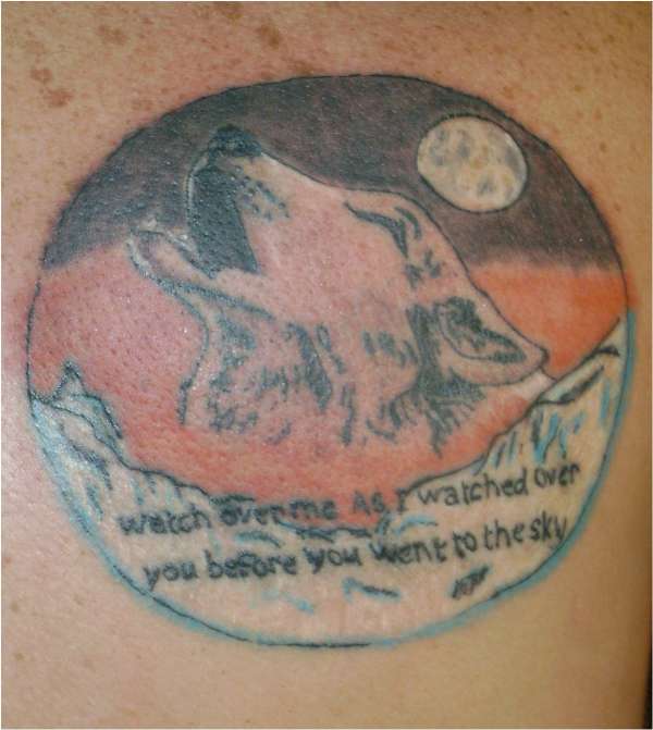 Wolf rememberence tattoo