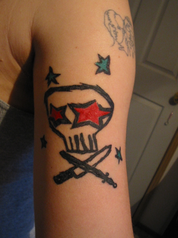 Skull With Cross Knife & Steel tattoo