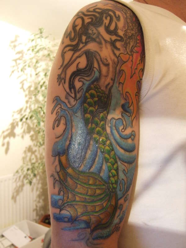 A little more colour to finish tail tattoo