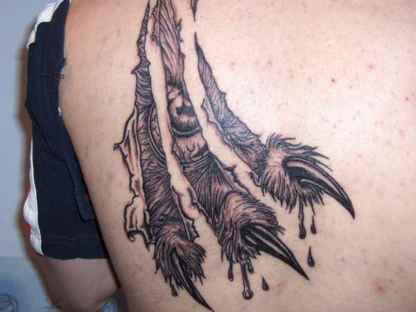 Claw tattoo