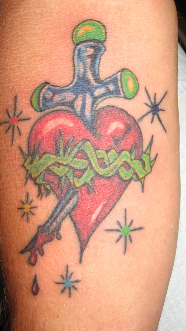 heart wth dagger tattoo