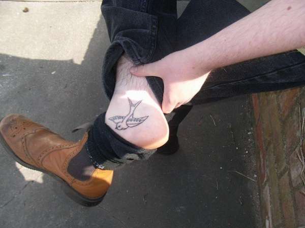 Ankle Swallow tattoo