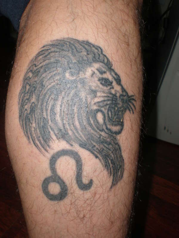 Lion touch up tattoo