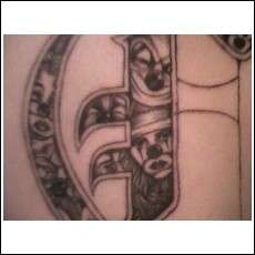 .:CL0WNS:. tattoo