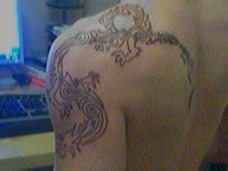 Dragon on shoulder tattoo