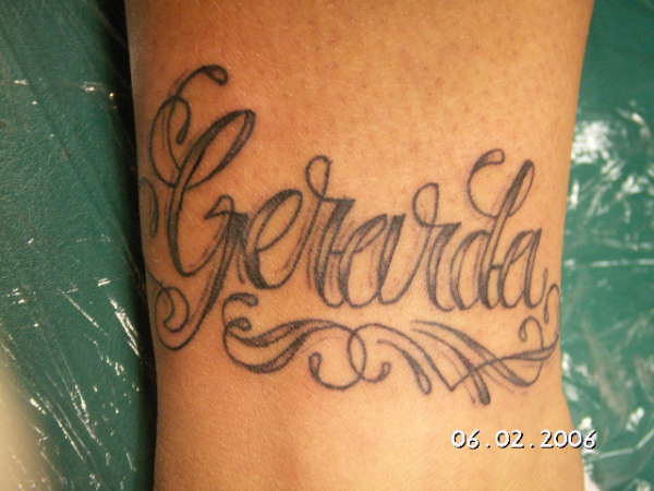 MOTHER'S NAME tattoo